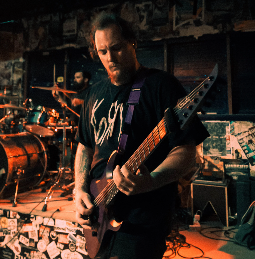 Drop G and No Bullshit: Sam Walker-Smith of Infinite Exile on Riffs, Resilience, and the Road